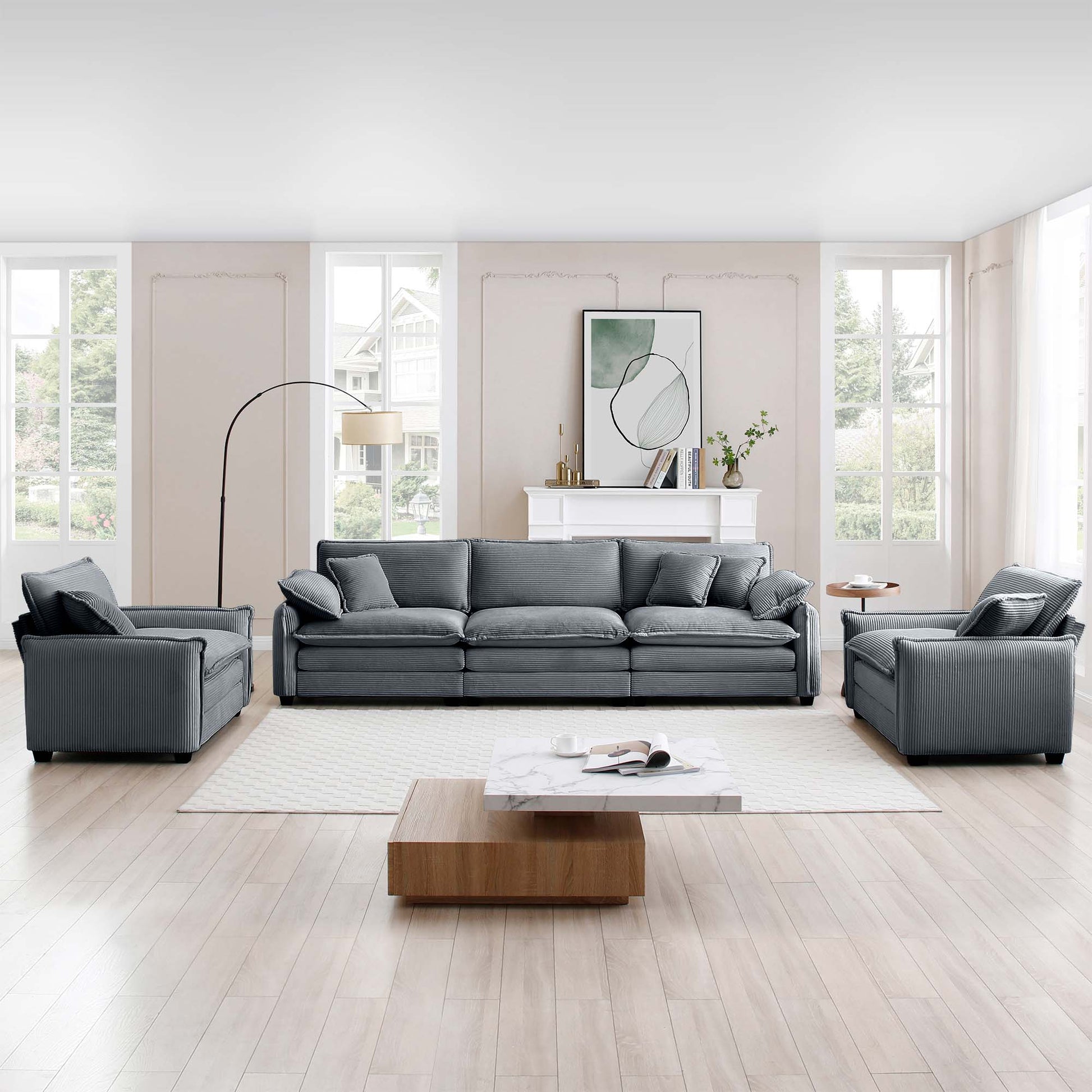 Plush grey corduroy sofa with wide armrests perfect for cozy living rooms
