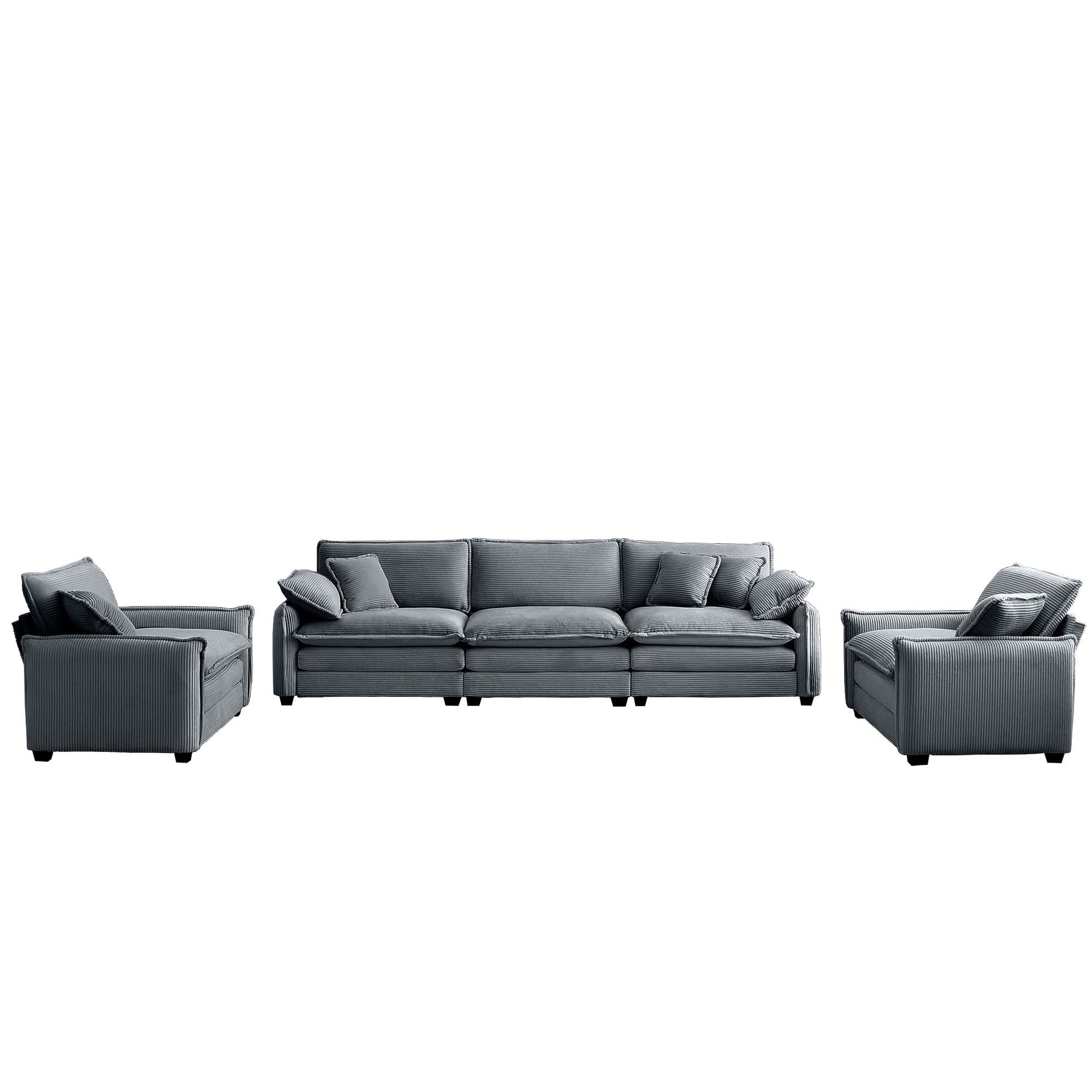 Threeseater dark gray corduroy sofa with plush cushions and matching armchairs