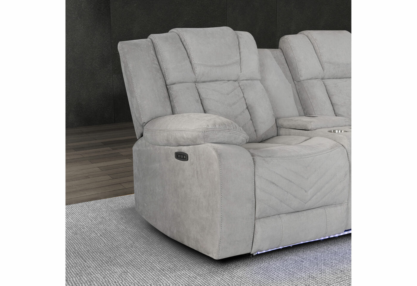 Gray power recliner sofa with diamond stitching and cup holders