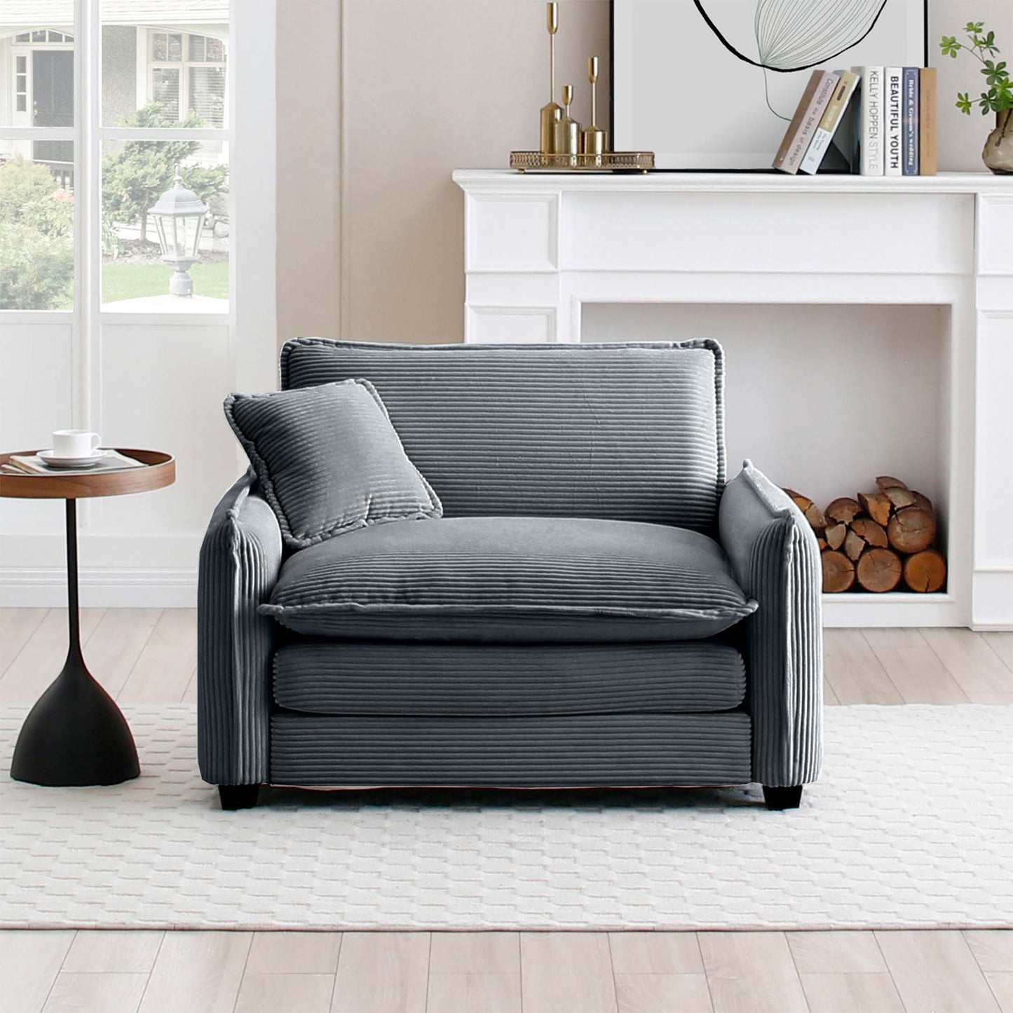 Plush gray corduroy armchair with a matching throw pillow perfect for cozy living rooms