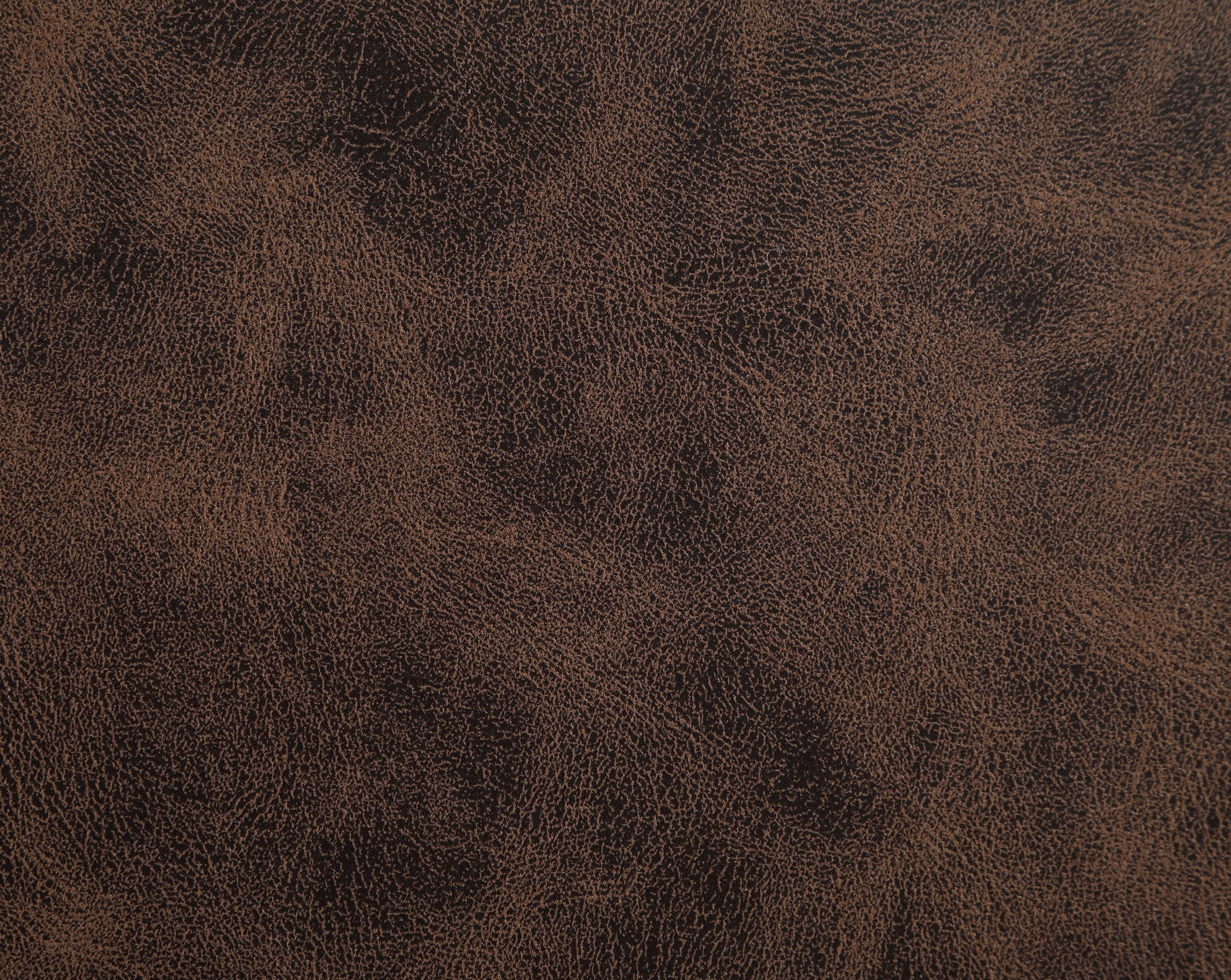 Rich brown faux leather fabric texture with a distressed grain pattern