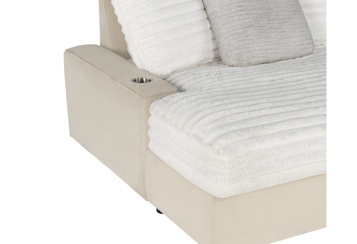Cream velvet sofa armrest with builtin cup holder and plush white pillows