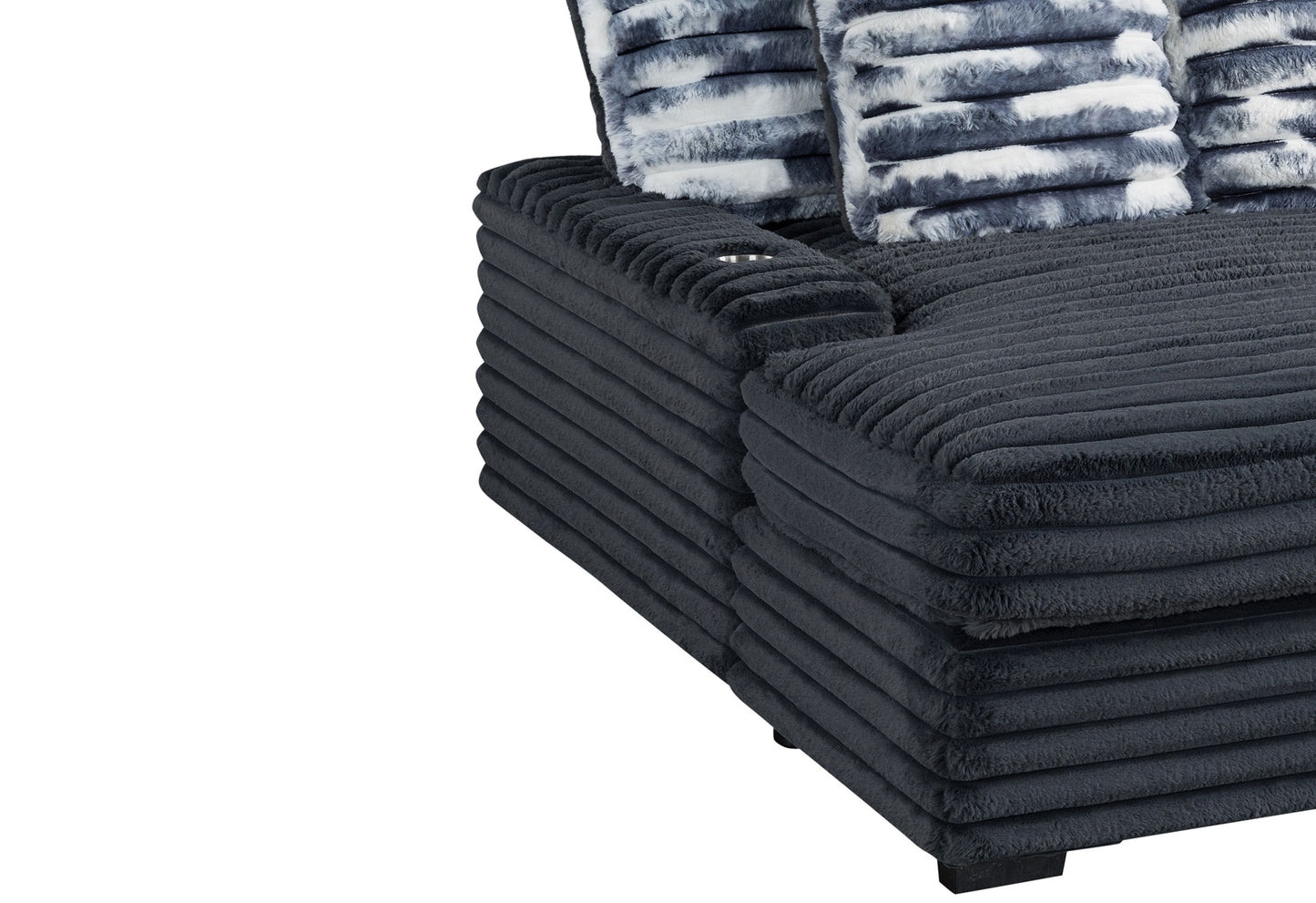 Dark gray corduroy sectional sofa with plush blue and white striped accent pillows