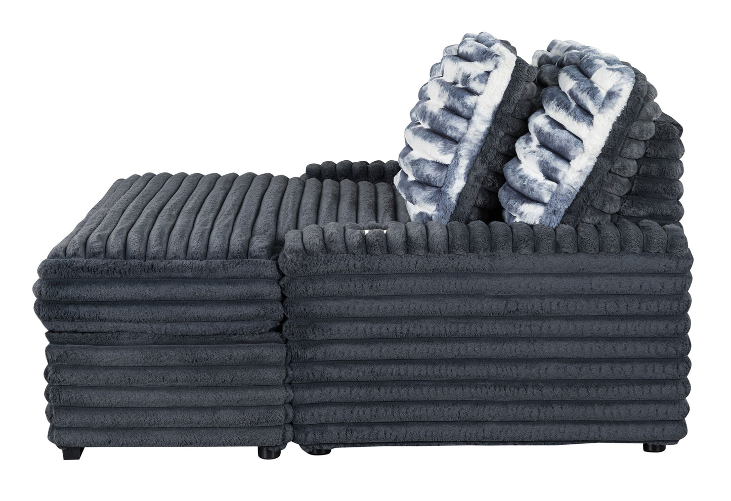 Plush ribbed dark grey sofa with two fluffy grey and white patterned cushions