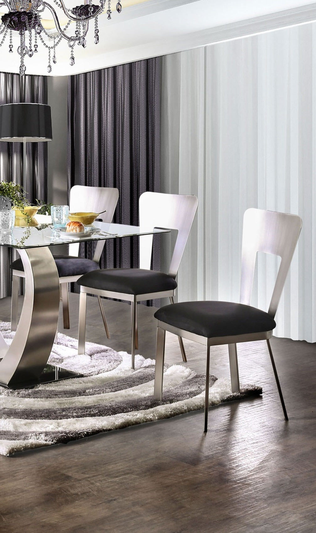 Modern silver dining chair with black cushion and brushed metal frame