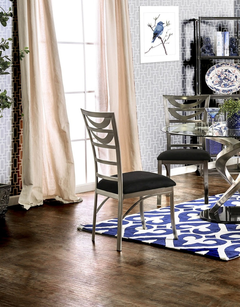 Silver metal dining chair with black upholstered seat