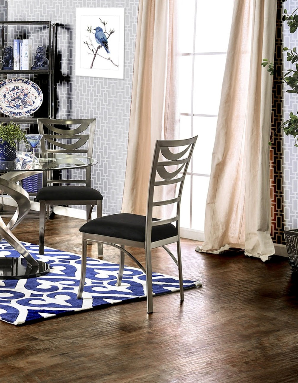 Modern silver dining chair with black upholstered seat