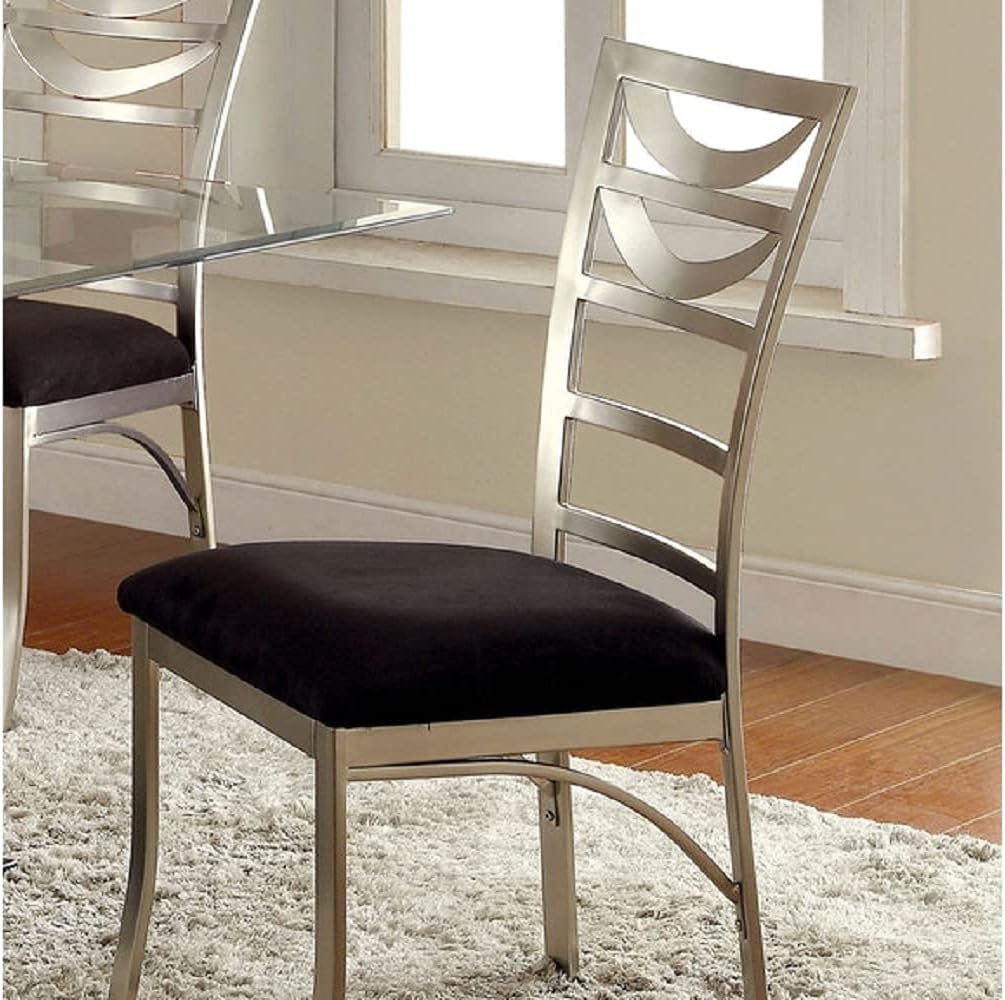 Sleek silver dining chair with a plush black velvet seat and modern curved back
