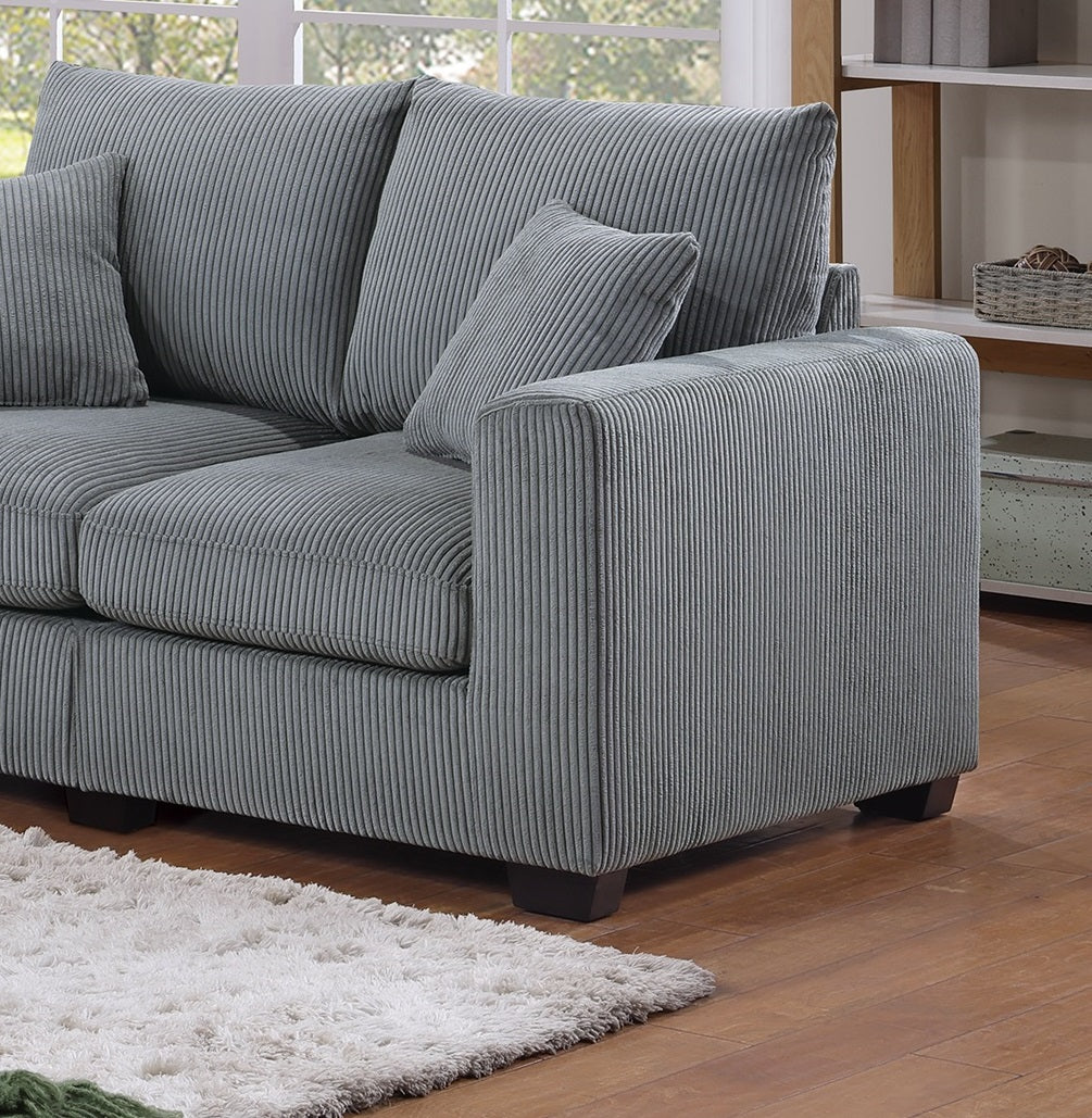 Gray corduroy sofa with plush cushions and stylish arms for comfortable living rooms