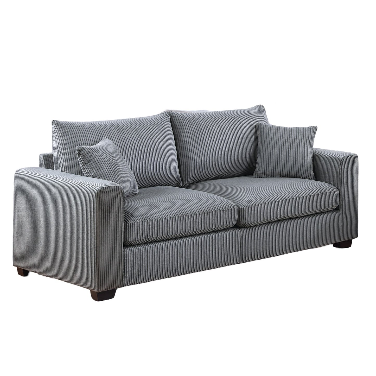 Grey corduroy sofa with plush cushions and two throw pillows perfect for modern living rooms