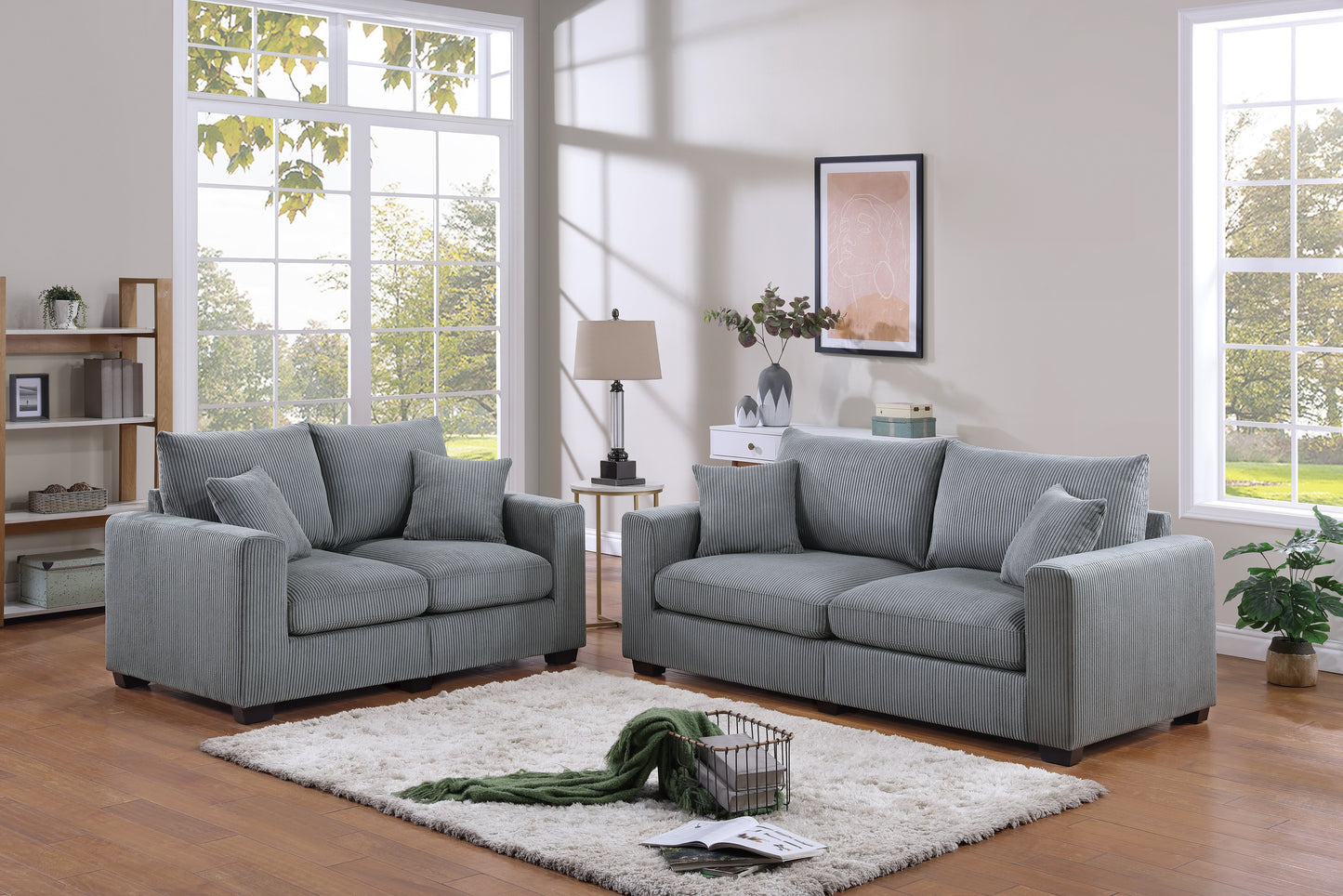 Gray corduroy sofa with plush pillows a modern living room staple