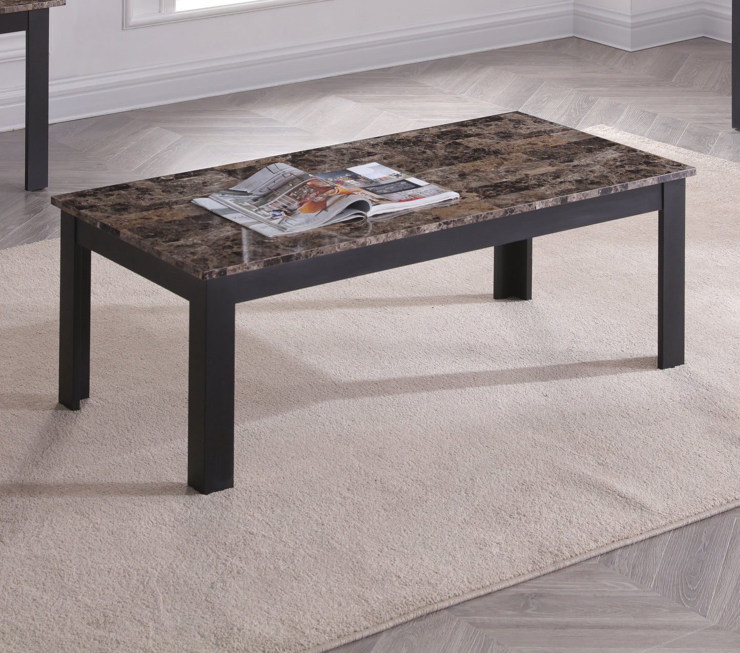 Rectangular coffee table with brown marble top and black legs