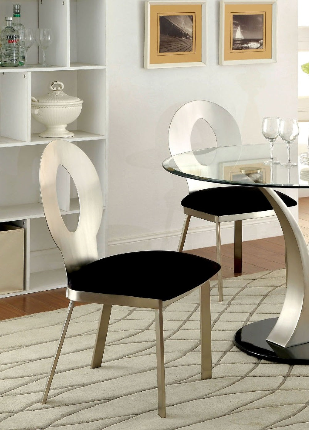 Modern metal dining chair with black velvet seat and oval back cutout