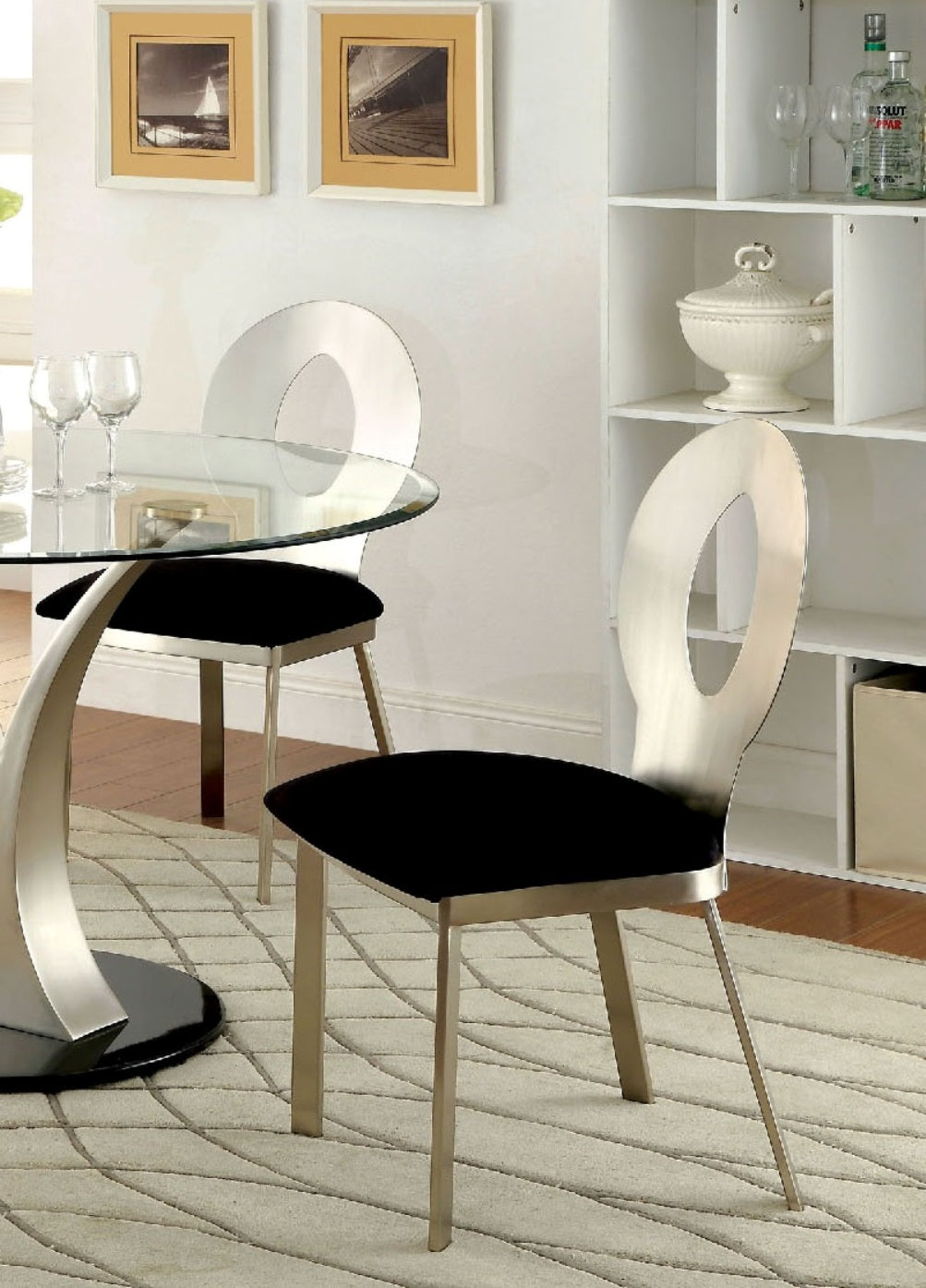 Modern silver dining chair with black upholstered seat and open oval back