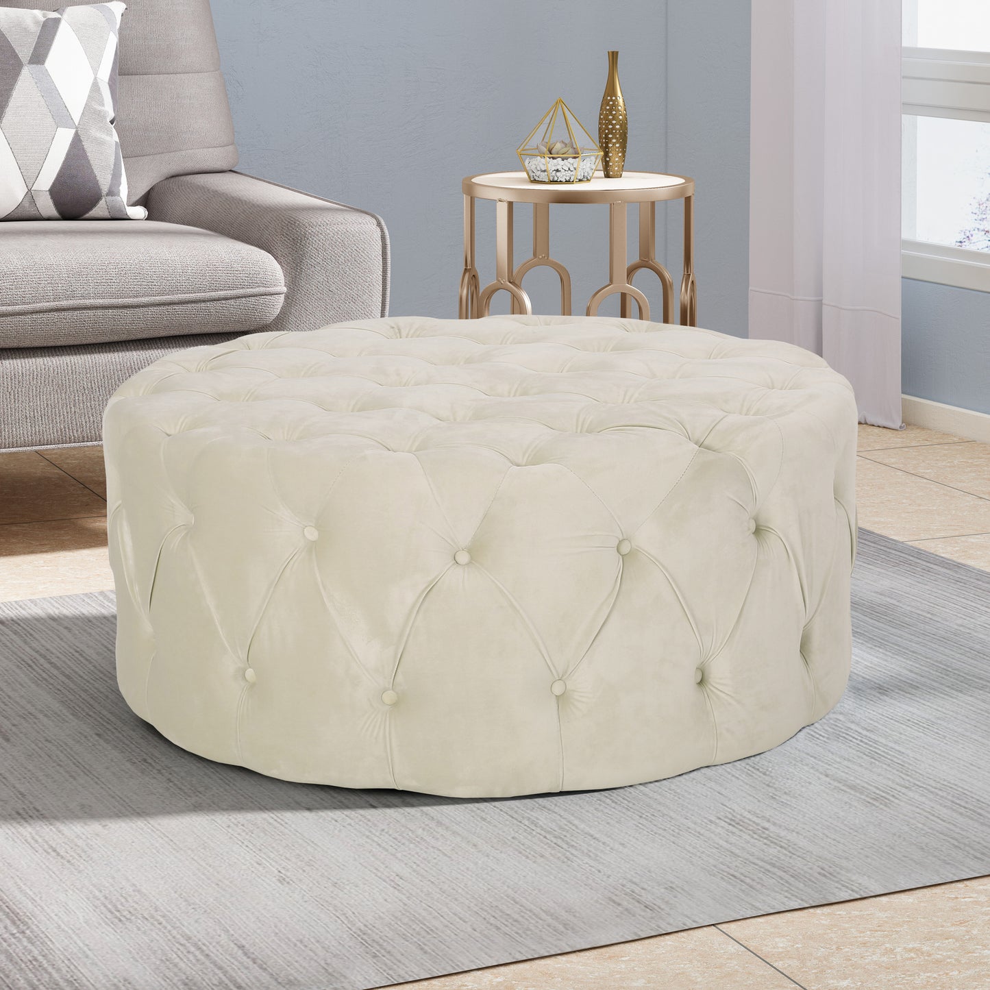 Cream velvet tufted round ottoman