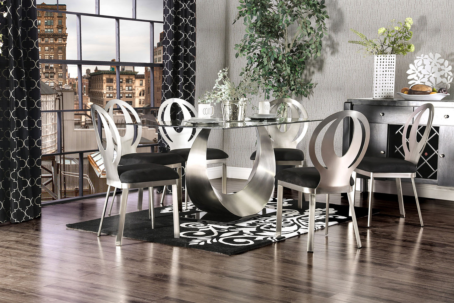Modern dining set with a sleek glass tabletop and a unique crescent metal base featuring six chairs