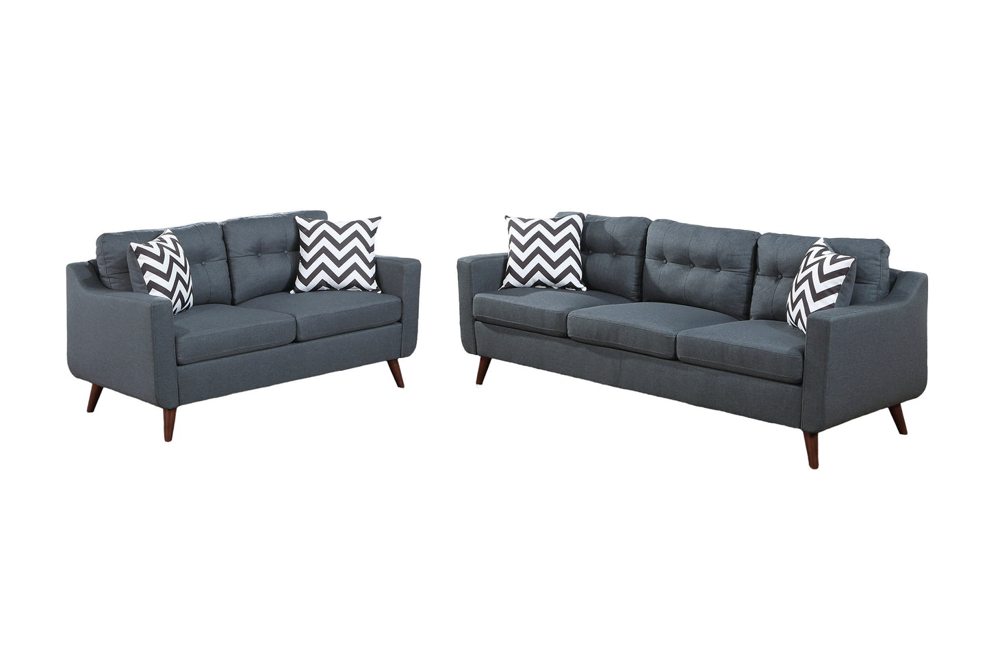 Dark grey tufted sofa set with chevron accent pillows perfect for modern living rooms