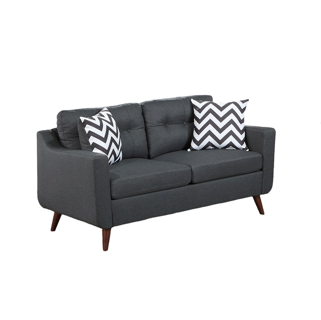 Modern charcoal fabric sofa with tufted back and chevron throw pillows