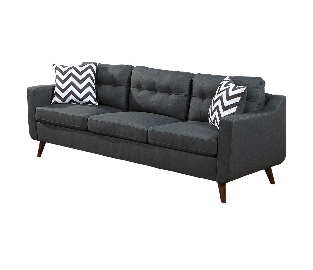 Modern charcoal grey fabric sofa with tufted back and chevron pillows