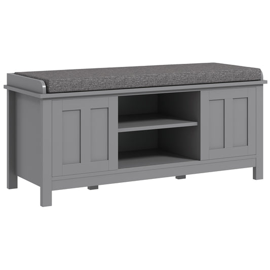 Gray wooden entryway bench with upholstered seat and two open shelves