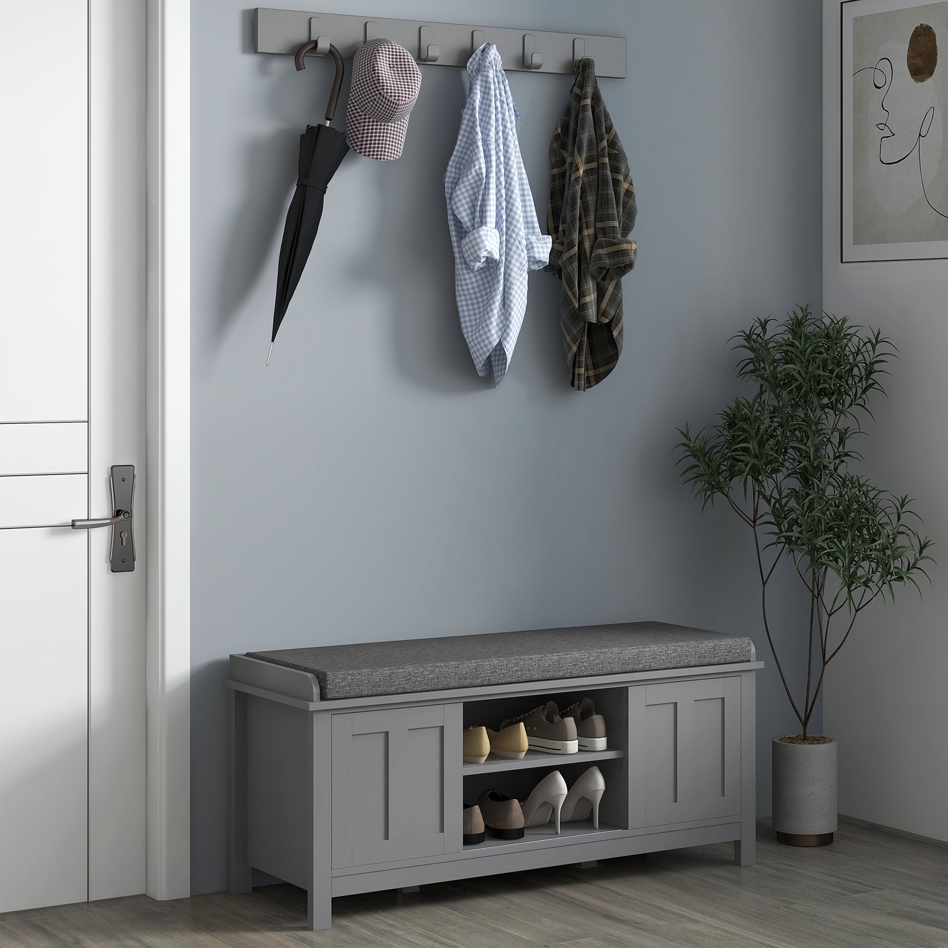 Grey upholstered entryway bench with shoe storage