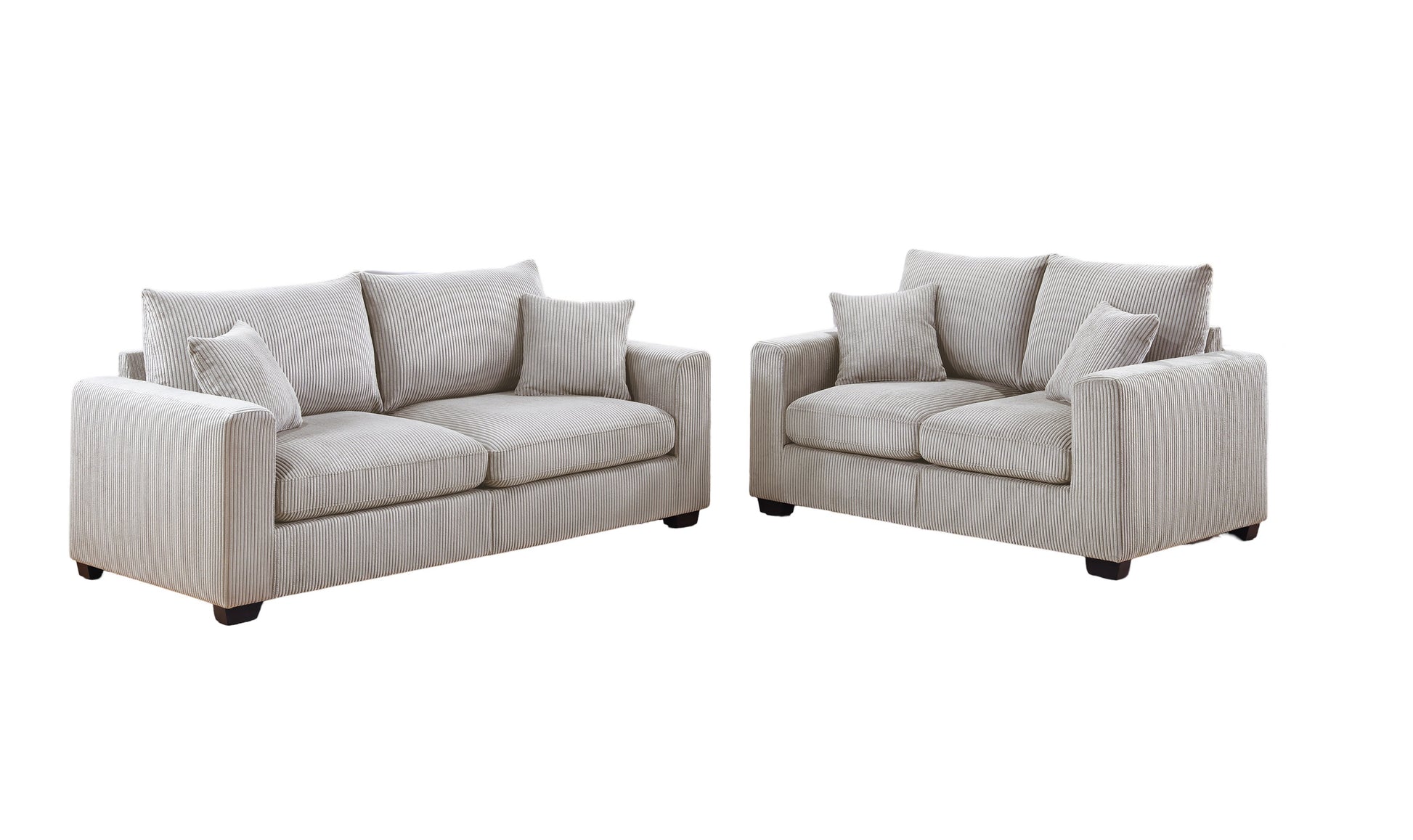 Two light gray corduroy sofas with matching accent pillows perfect for a modern living room