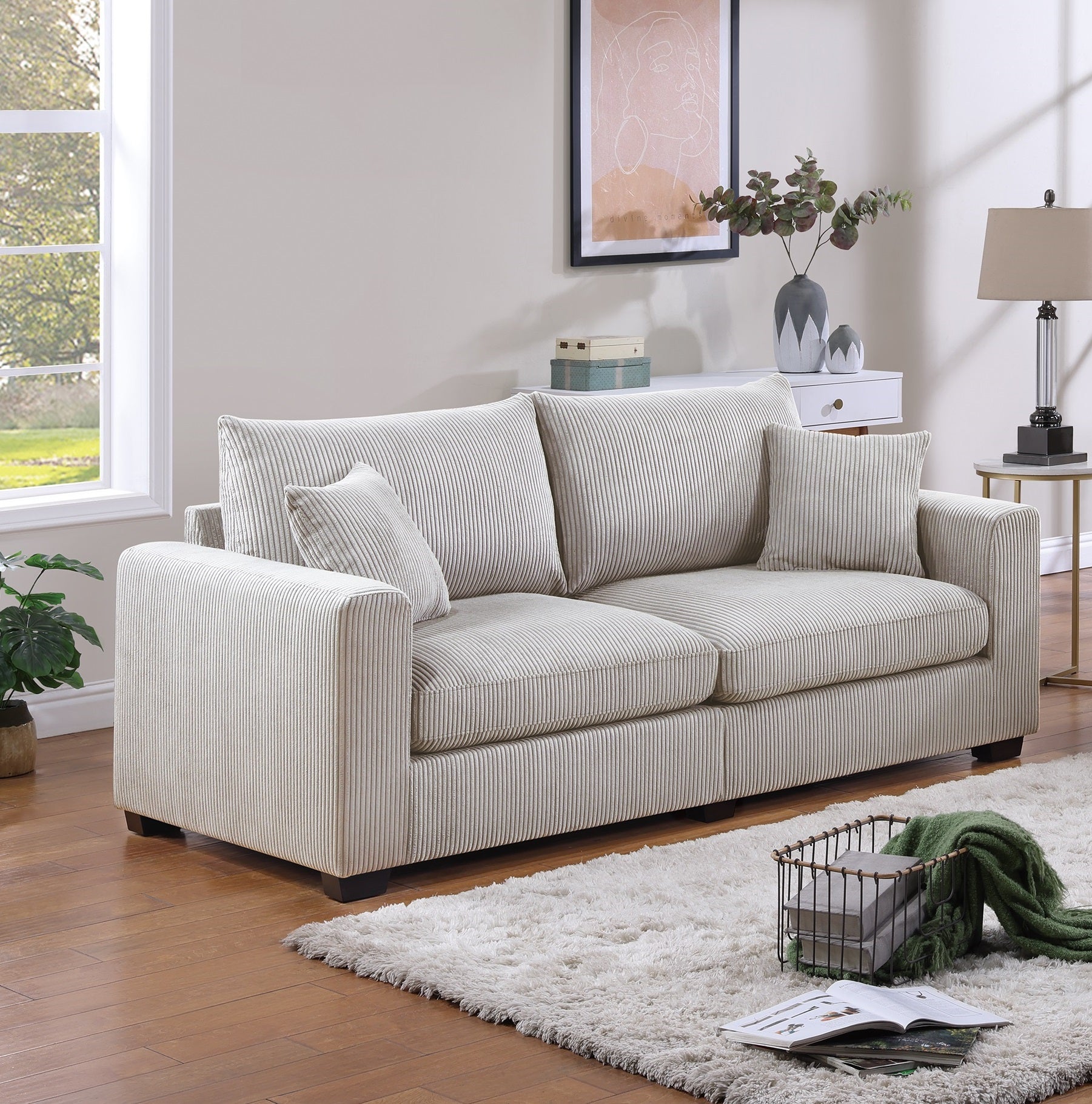Cream corduroy sofa with plush cushions and textured upholstery for living room comfort