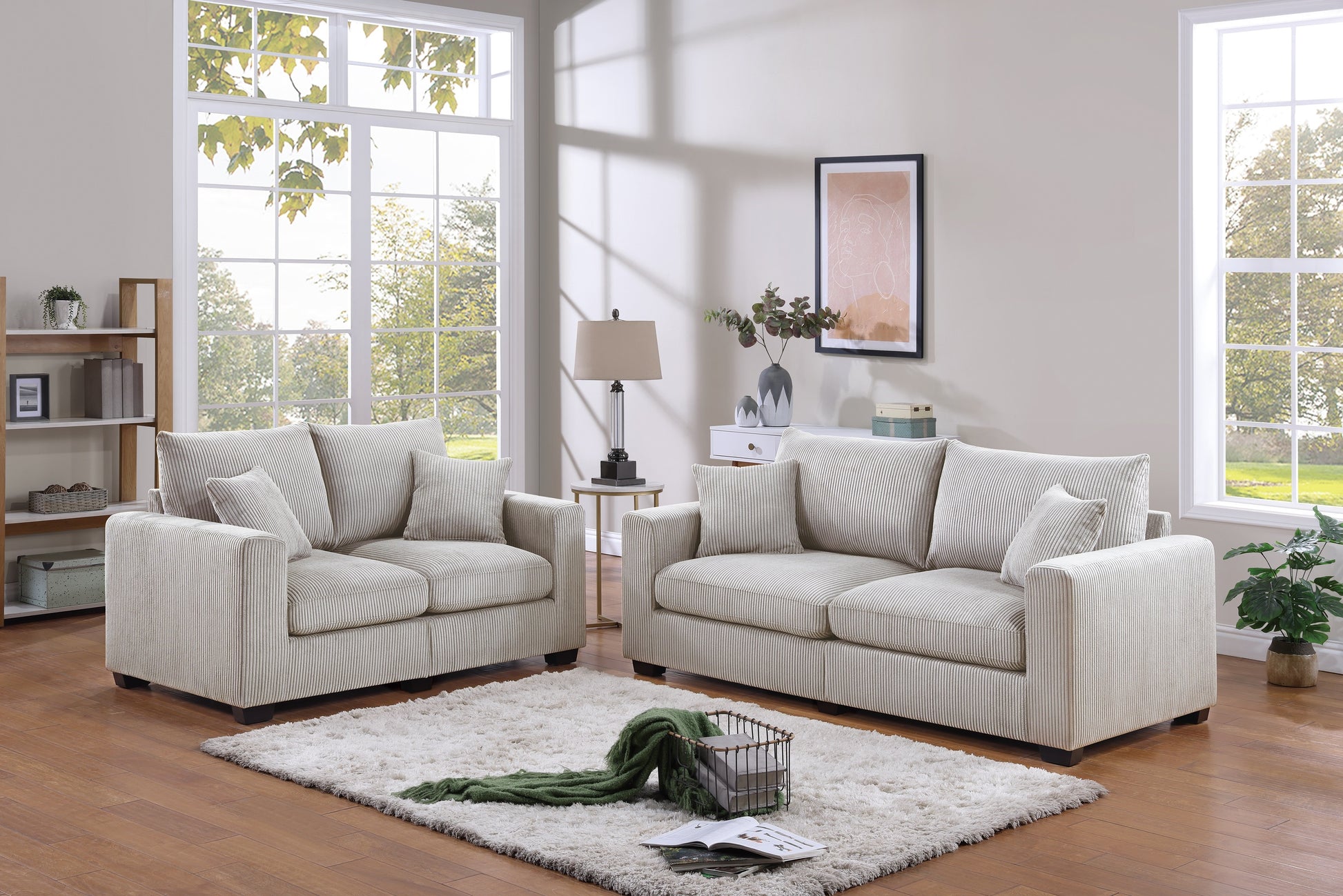 Cream corduroy sofa set with plush cushions and a matching loveseat