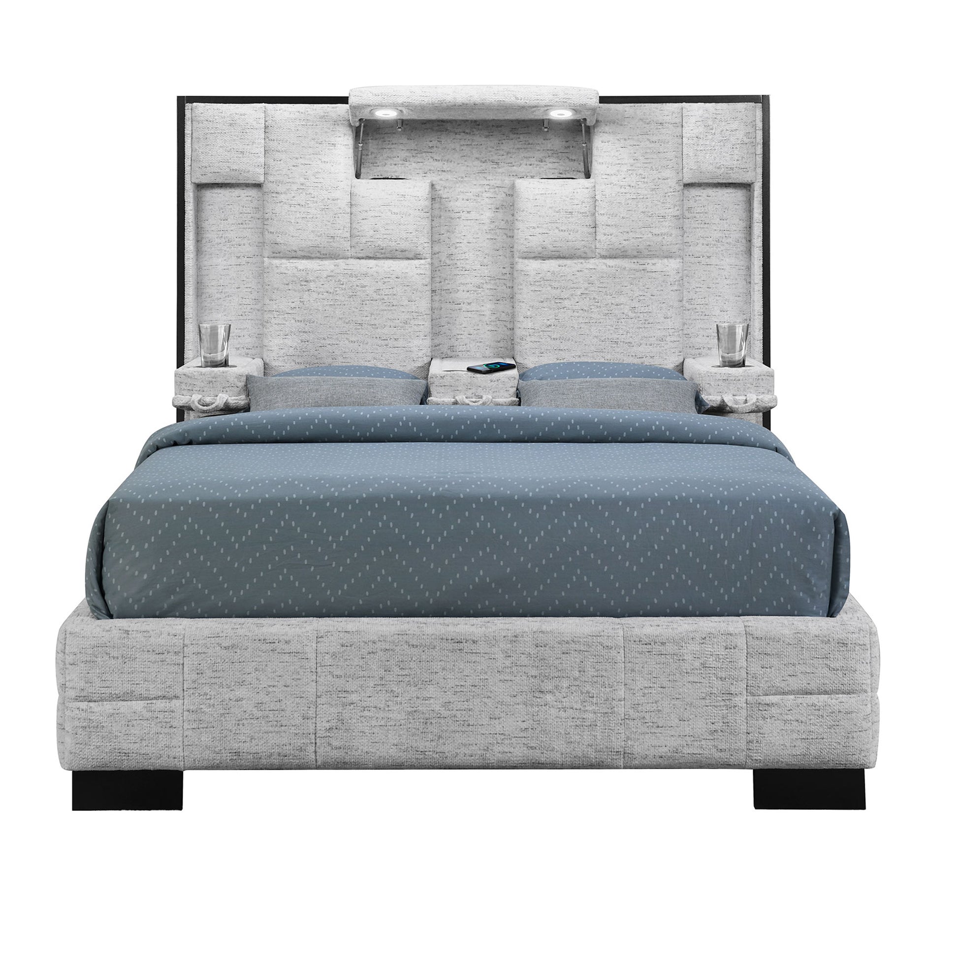 Modern upholstered bed in light grey fabric with builtin bedside lights and a subtle chevron duvet
