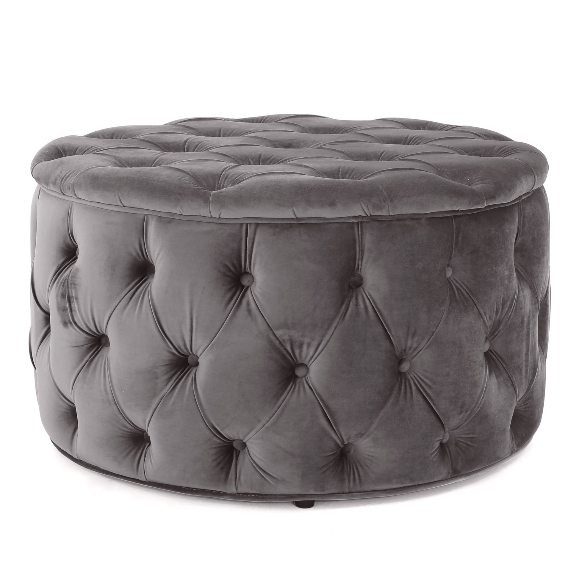Round gray velvet ottoman with button tufting