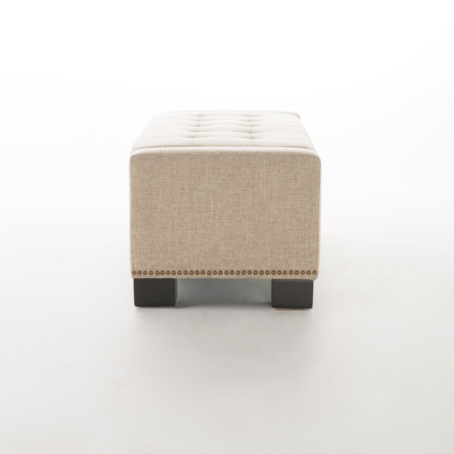 Tufted linen ottoman bench with nailhead trim