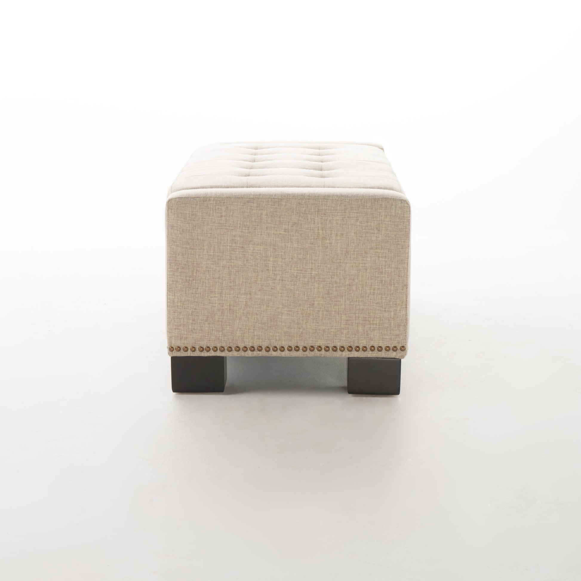 Tufted linen ottoman bench with nailhead trim