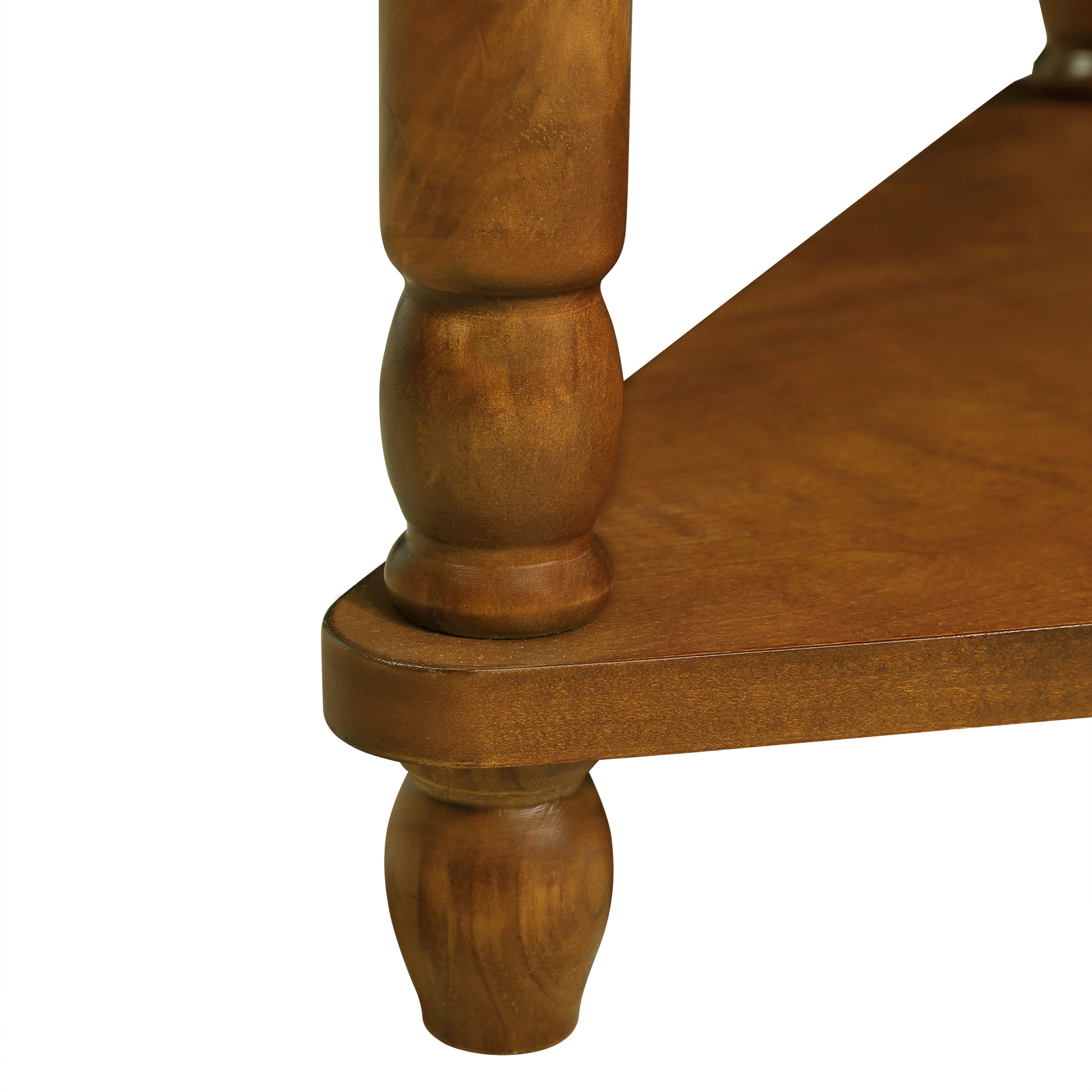 Detail of a solid wood end tables turned leg and edge in a warm chestnut finish