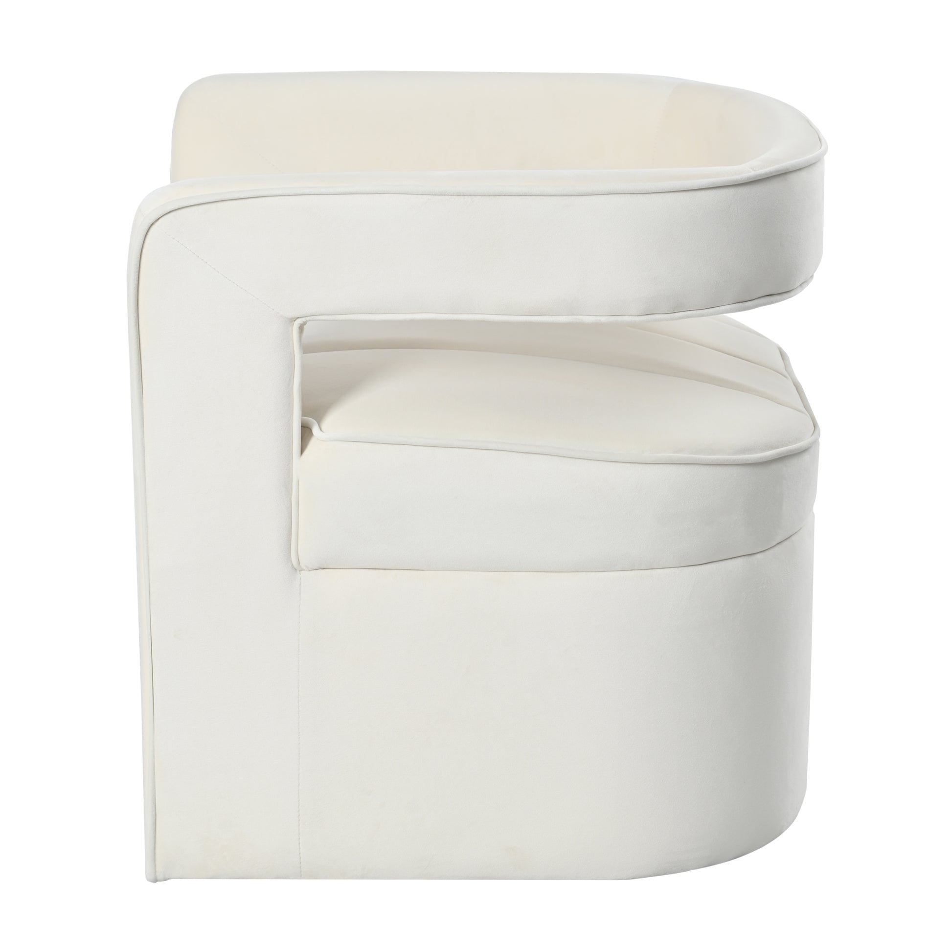 Cream velvet armchair with curved back and open arm design
