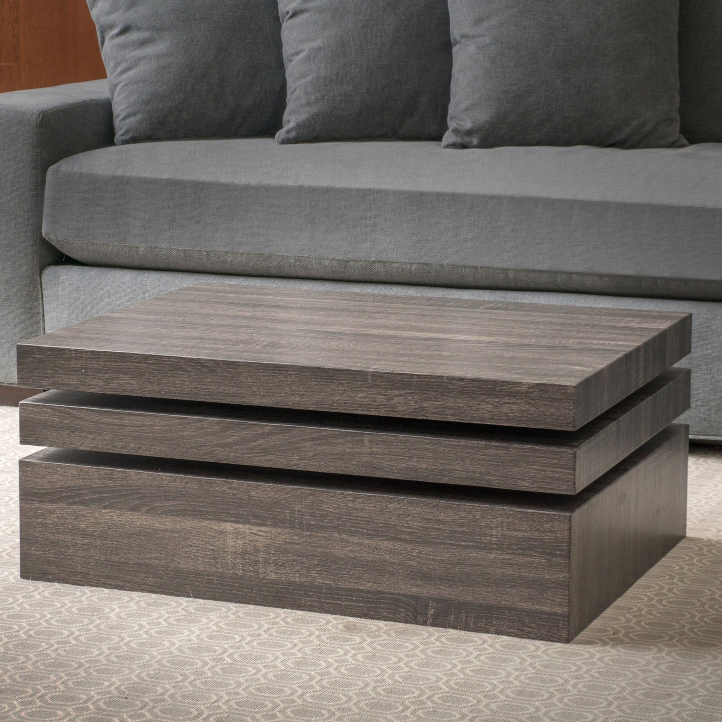 Modern dark wood threetier coffee table with clean lines