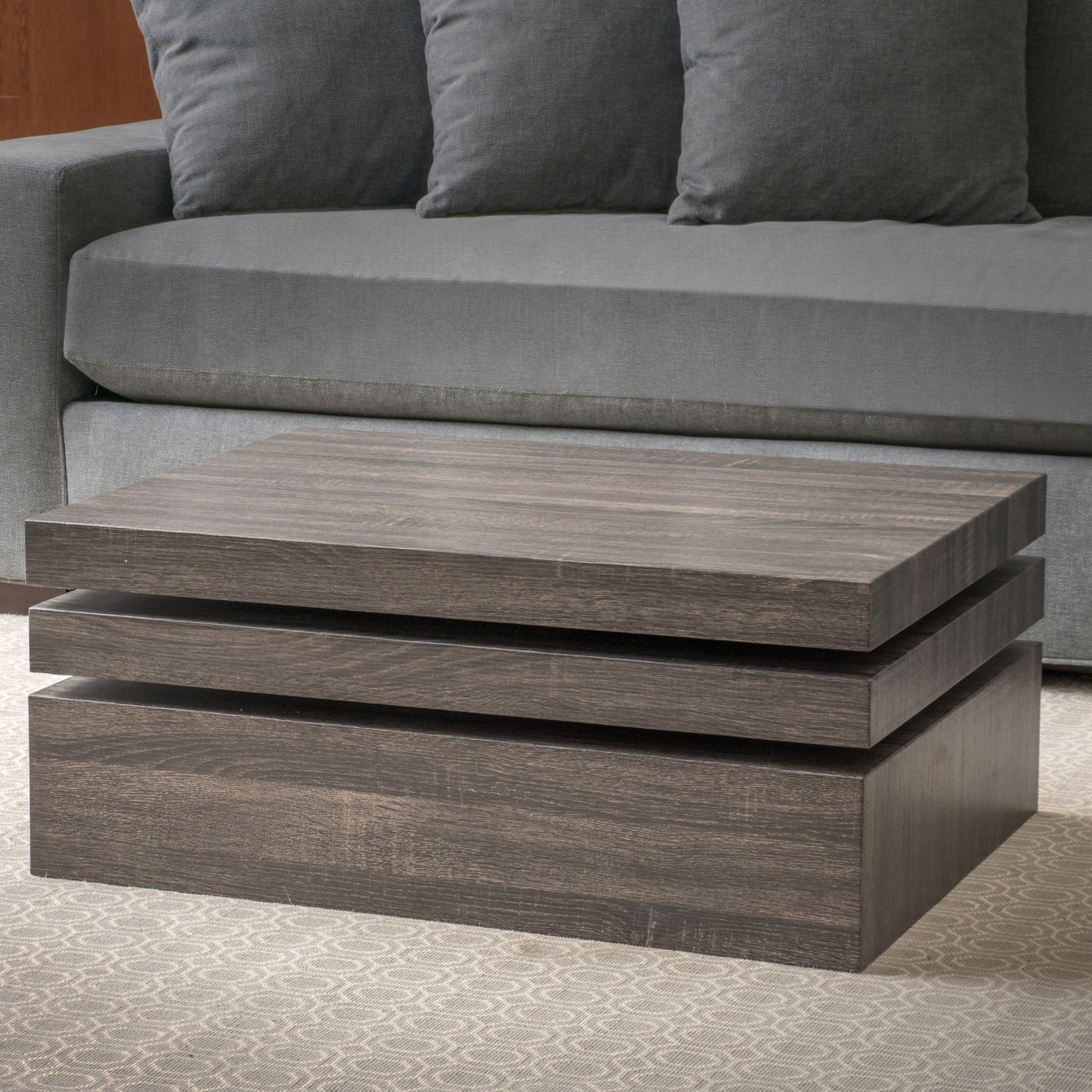 Modern dark wood threetier coffee table with clean lines