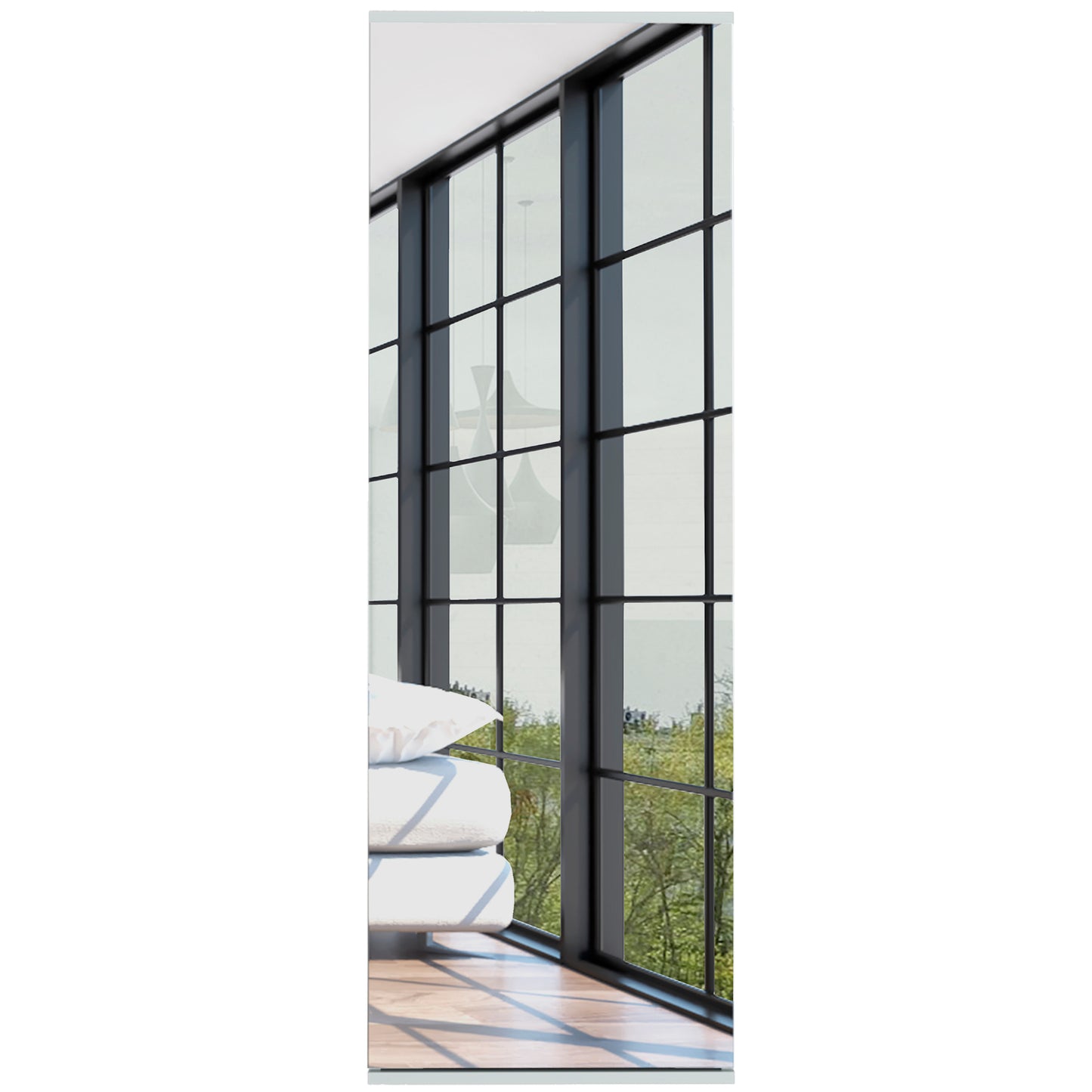 Modern black metal framed window with sheer curtains and lush green trees outside