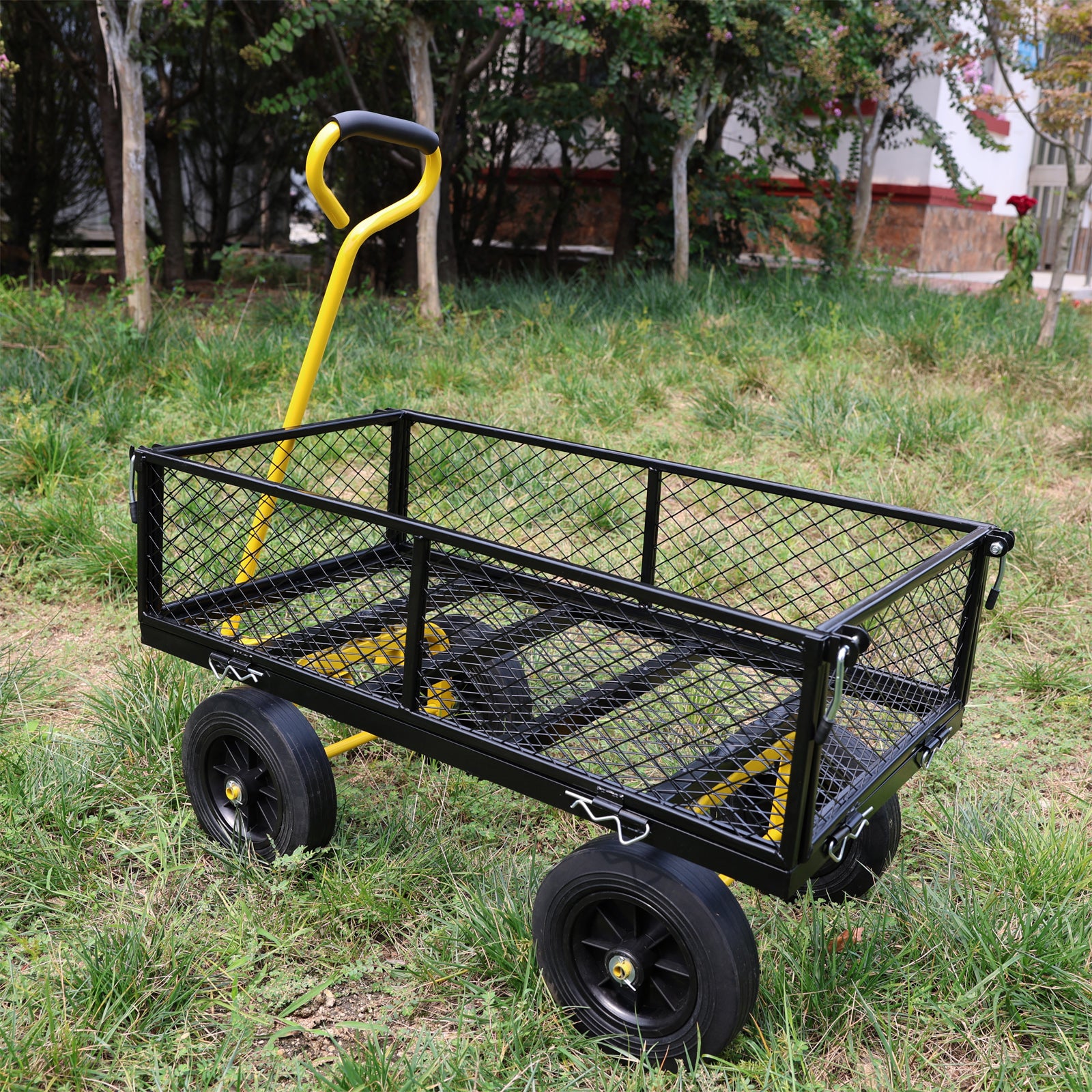 Black metal mesh garden wagon with yellow handle and frame ideal for hauling yard waste
