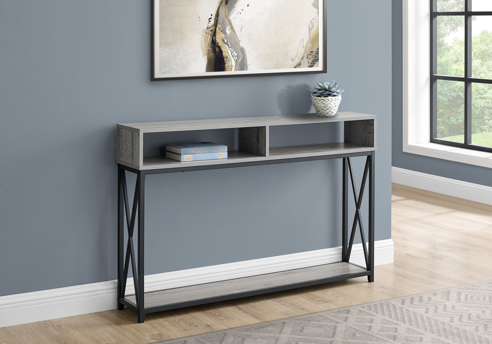 Gray wash wood and black metal console table with open shelving and a lower shelf