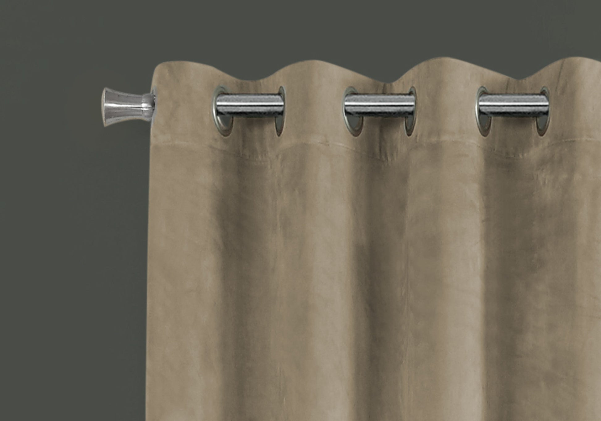 Taupe grommet curtains with a silver metal rod and finial