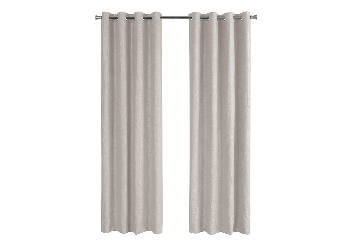 Light beige textured eyelet curtains hanging on a metal rod