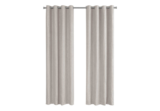 Light beige textured eyelet curtains hanging on a metal rod