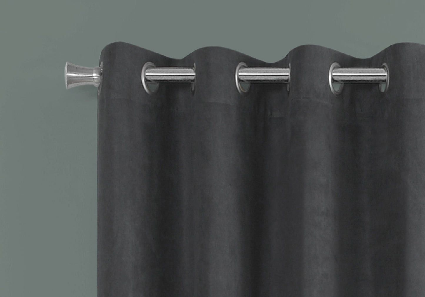 Charcoal grey velvet curtain with polished chrome grommets and finial