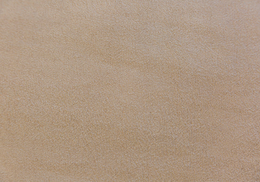 Closeup of a textured beige fabric ideal for upholstery or home decor applications