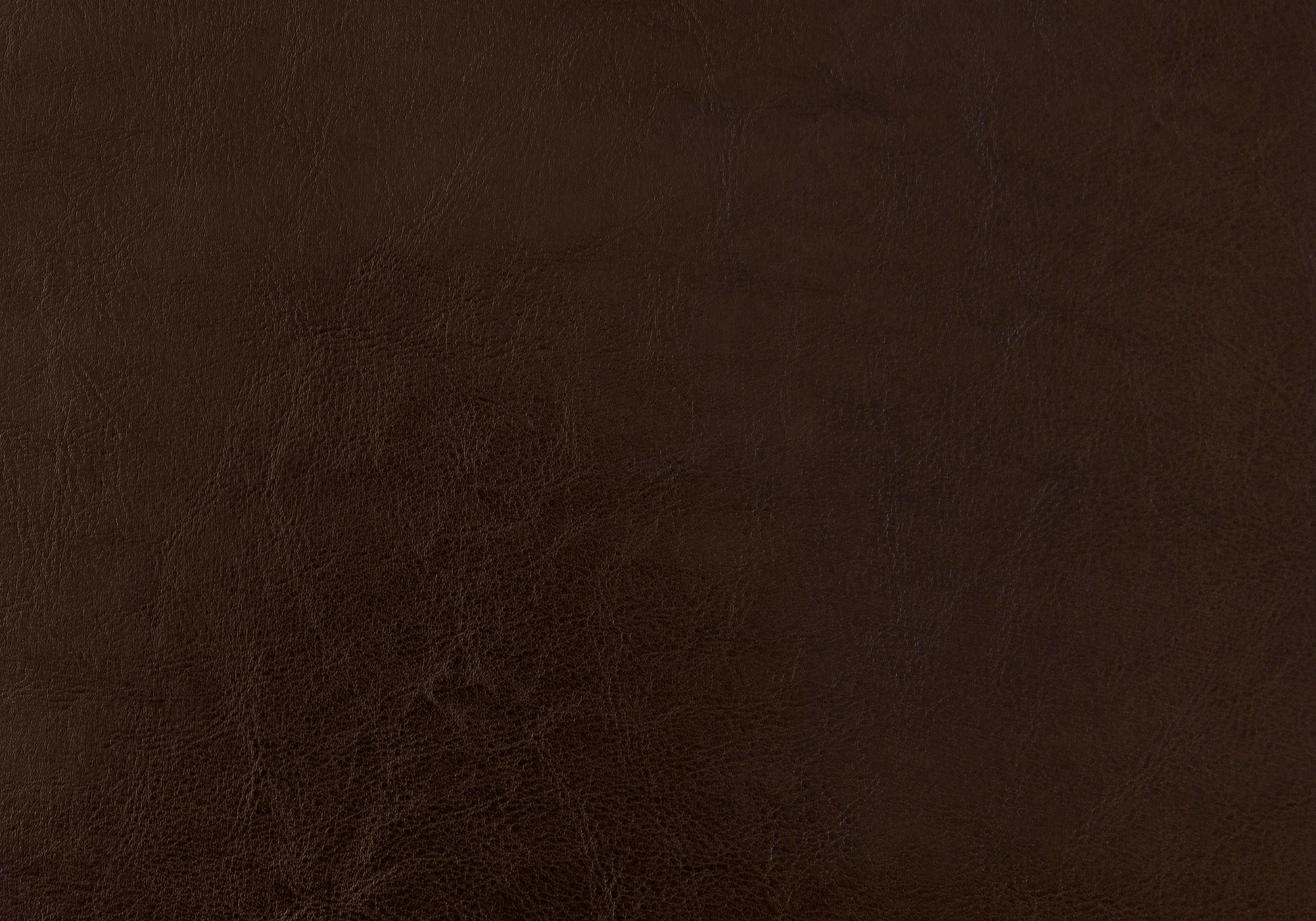 Rich dark brown faux leather upholstery texture for furniture
