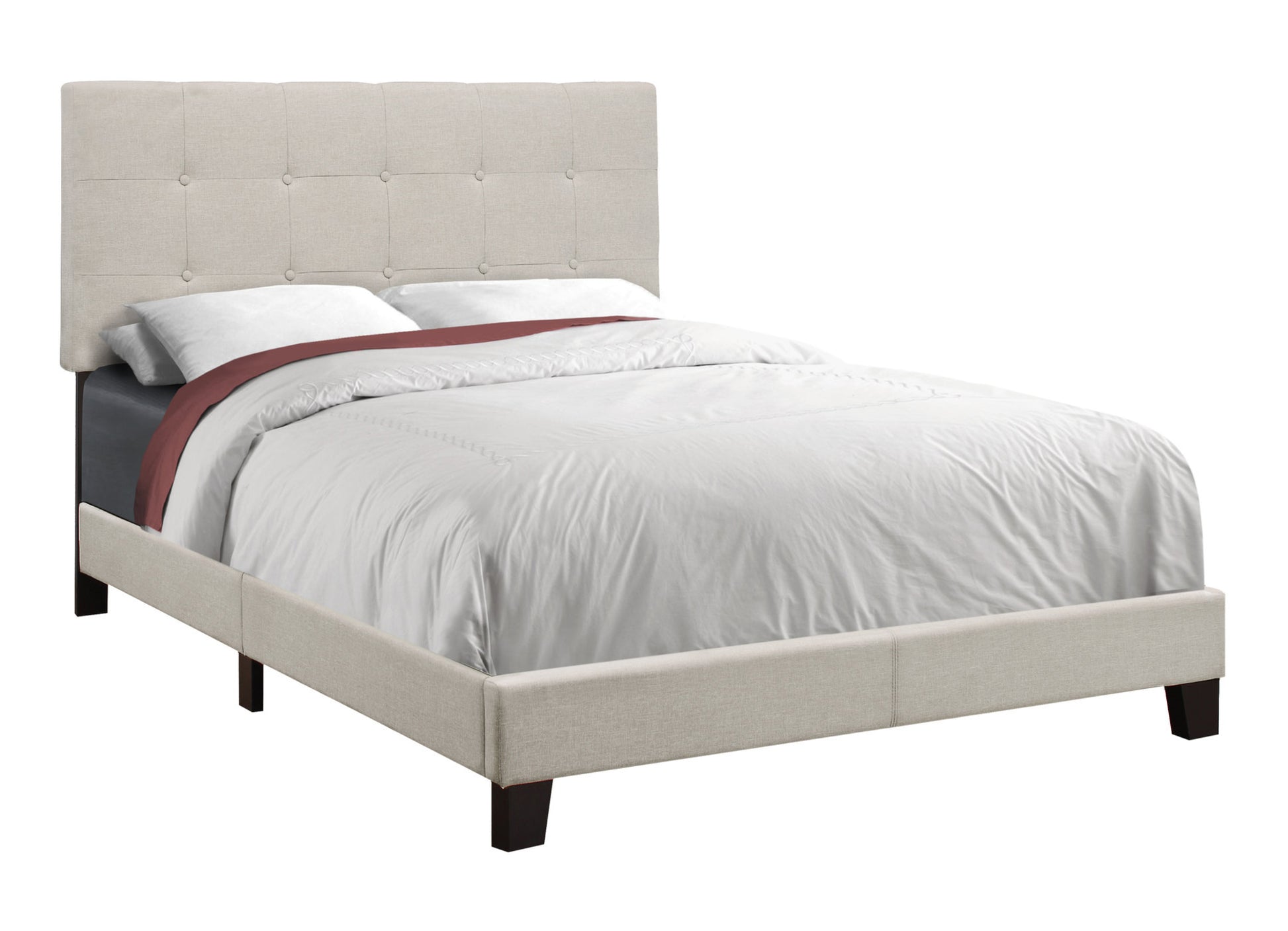Tufted linen upholstered bed frame in beige with dark wood legs