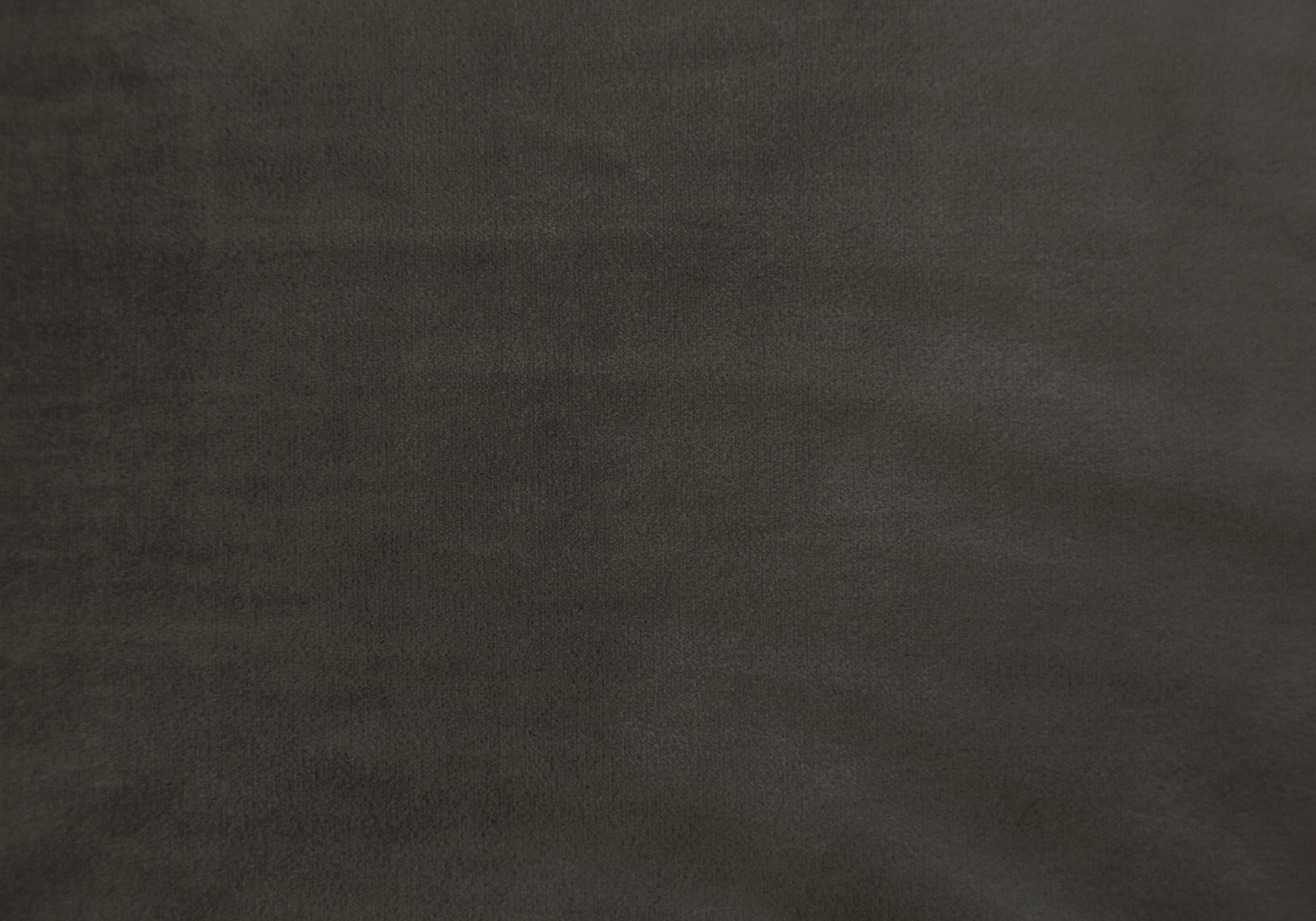 Dark gray velvet fabric swatch with soft texture