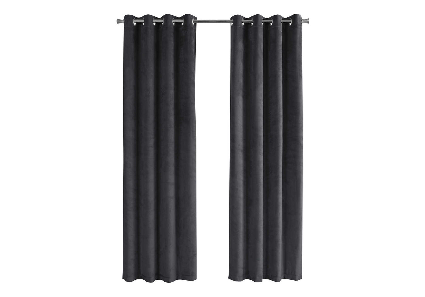 Dark grey velvet grommet curtains hanging on a silver rod for window decor