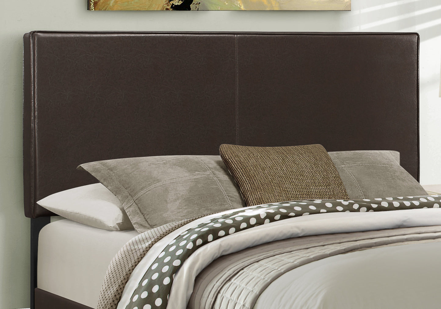 Dark brown faux leather headboard with clean lines and stitching detail