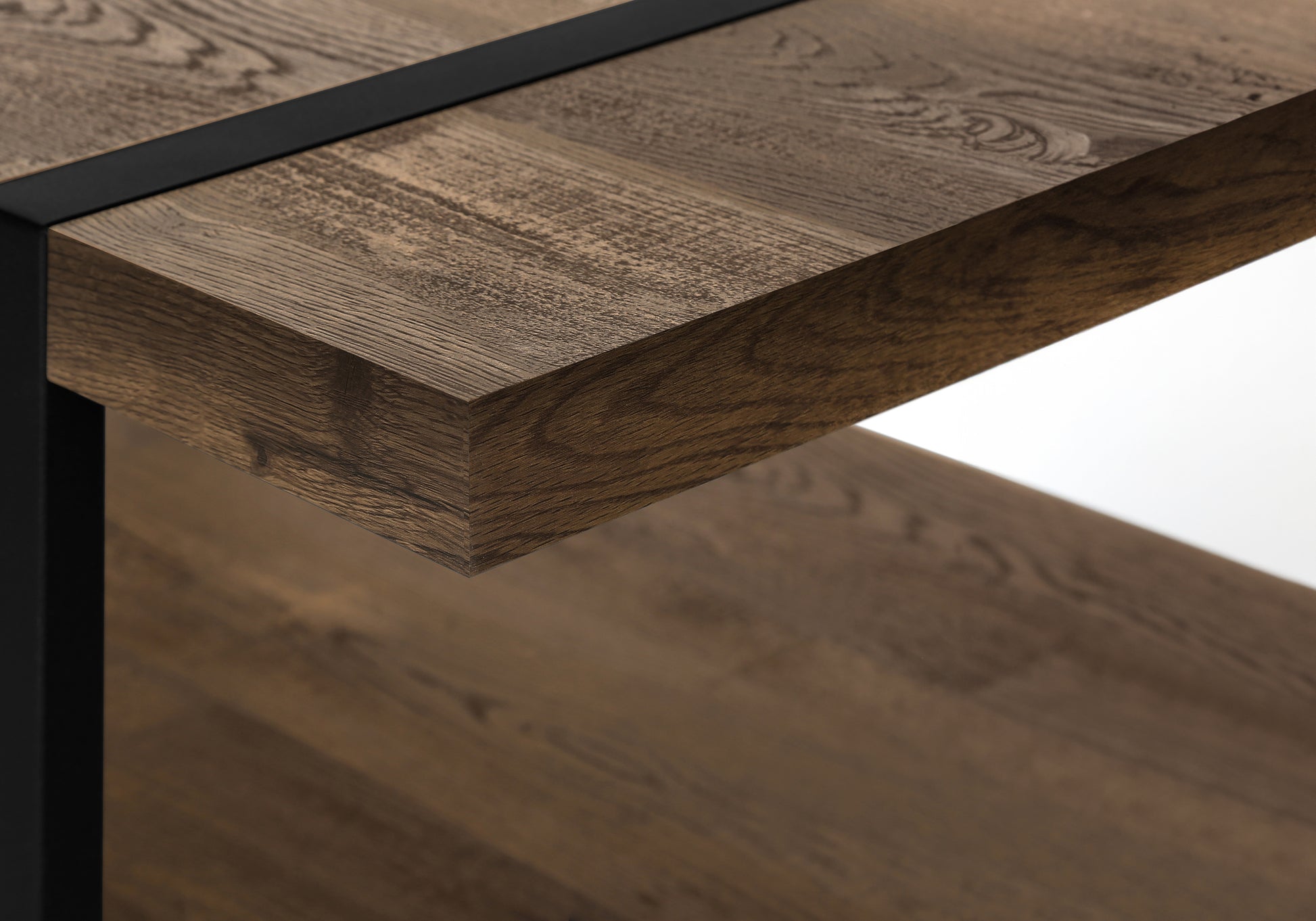 Rustic oak wood shelf with black metal trim accent for modern storage